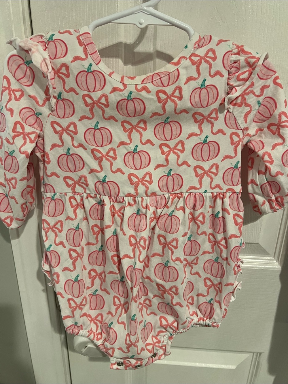 Ruffle Butts pink pumpkin romper